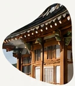 The painted eaves of a traditional Korean hanok building